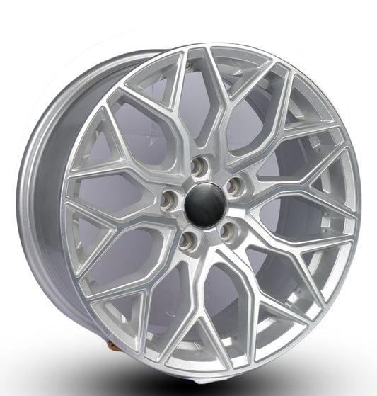 Silver alloy wheel on a white background