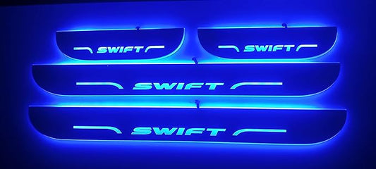 Set of car door sills with 'Swift' branding on a dark background