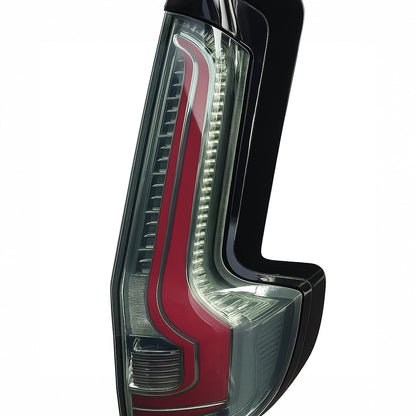 Car tail light with red and black design on a white background