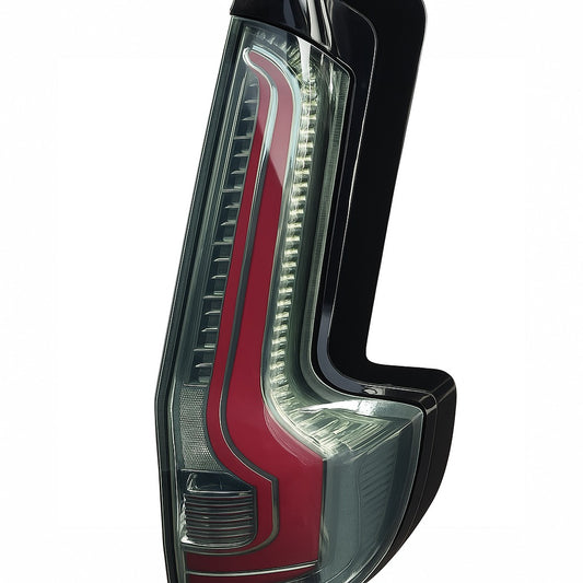 Car tail light with red and black design on a white background