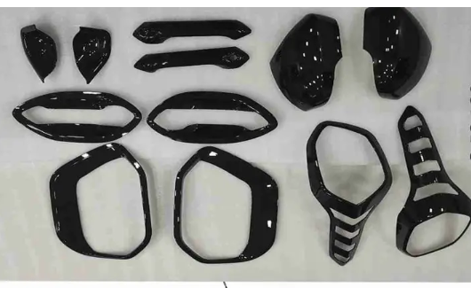 Set of black car interior parts on a white background
