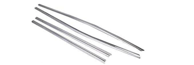 Three metal rods of varying lengths on a white background
