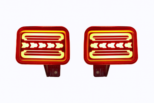 Two red rectangular lights with a white background