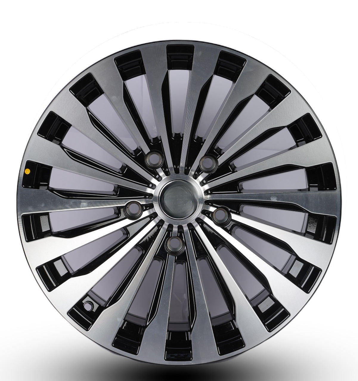 Chrome car wheel rim on a white background