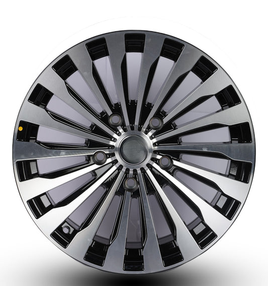 Chrome car wheel rim on a white background