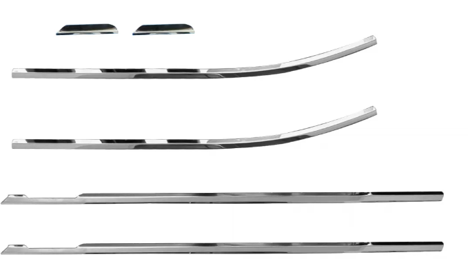 Set of chrome car trim pieces on a white background